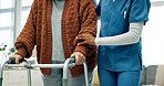 Senior, woman and physio hands with walker, support and assistance for rehabilitation in nursing home. Healthcare worker, help and elderly person with disability, mobility aid and physical therapy.