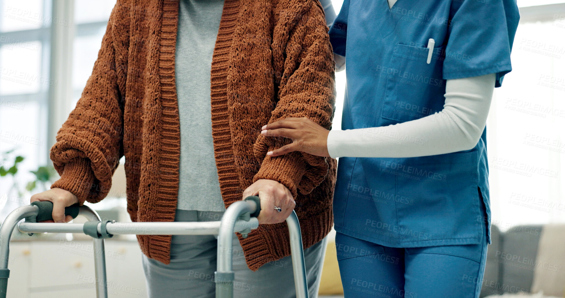 Buy stock photo Senior, woman and physio hands with walker, support and assistance for rehabilitation in nursing home. Healthcare worker, help and elderly person with disability, mobility aid and physical therapy.