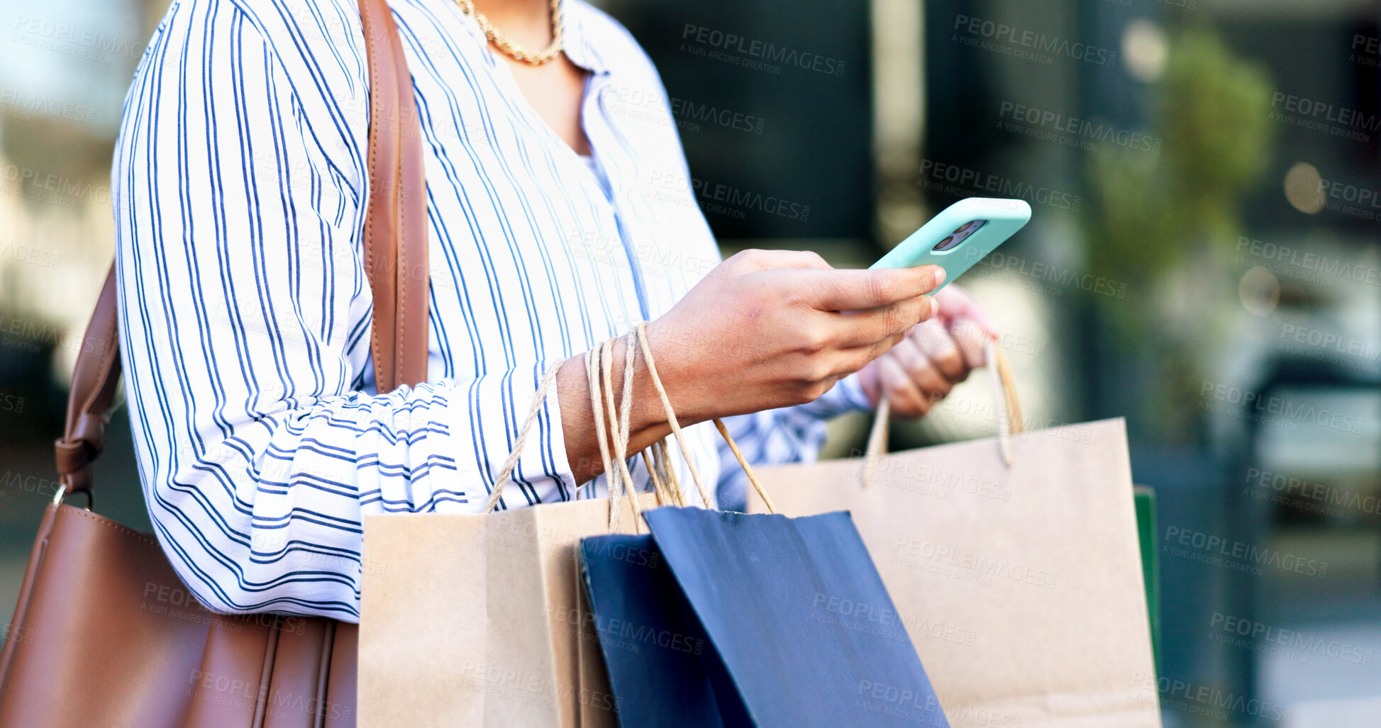 Buy stock photo Cellphone, shopping bags and hands of woman in city with online sale, discount or promotion with retail. Technology, customer and female person with phone for ecommerce purchase in urban town.