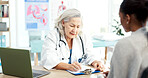 Doctor, writing and meeting with patient, healthcare and explain medical diagnosis and test results. Mature person, notes and health professional with clipboard, wellness and appointment in hospital