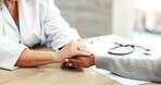 Healthcare, hands and doctor with patient comfort for health diagnosis, medical support and empathy. Professional, women and console in hospital consultation for test results, bad news and follow up