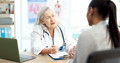 Buy stock photo Doctor, talking and meeting with patient, healthcare and explain medical diagnosis and test results. Mature person, notes and health professional with clipboard, wellness and appointment in hospital
