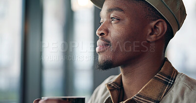 Buy stock photo Black man, coffee and thinking in cafe for reflection, drink and relax with inspiration at restaurant. Person, daydreaming and cup with memory, remember and perspective with beverage at diner