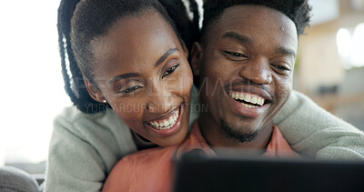 Buy stock photo Couple, bonding and laughing with tablet in home, entertainment or streaming video with subscription. Black people, scroll and happy with partner on couch, online and watching funny movie with tech