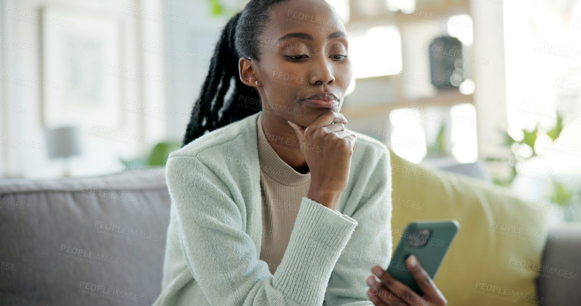 Buy stock photo Thinking, cellphone and black woman on sofa in home with networking, connection or texting on mobile app. Relax, decision and female person with phone for chatting, communication or social media.