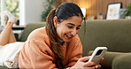 Happy, relax and woman on sofa with phone, online conversation and message notification on weekend. Home, smile and person typing on cellphone for internet, website and social media in living room