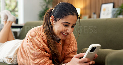 Buy stock photo Happy, relax and woman on sofa with phone, online conversation and message notification on weekend. Home, smile and person typing on cellphone for internet, website and social media in living room