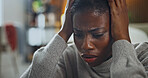 Black woman, anxiety and burnout in living room for fear, overthinking or loss with pressure or phobia. Trauma, panic or female person with depression in home with stress for mental health crisis