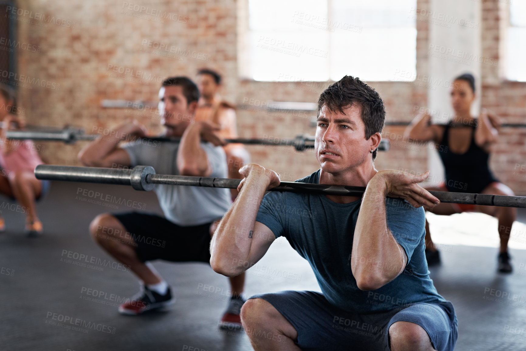 Buy stock photo Man, people and barbell at gym for fitness, exercise and challenge for strength training. Strong, male person and community with equipment for weightlifting, endurance workout and resilience wellness