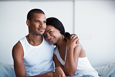 Buy stock photo Cropped shot of a young couple enjoying their morning at home