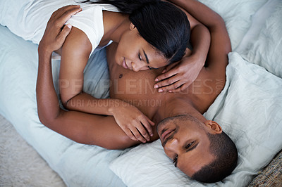 Buy stock photo Cropped shot of a young couple enjoying their morning at home