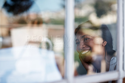 Buy stock photo Cropped shot of a young couple enjoying their morning at home
