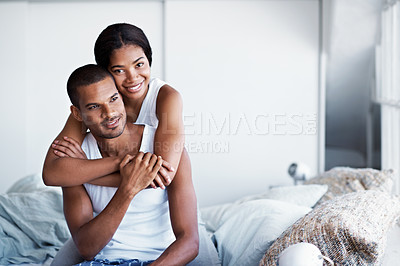 Buy stock photo Cropped shot of a young couple enjoying their morning at home