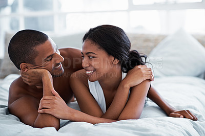 Buy stock photo Cropped shot of a young couple enjoying their morning at home