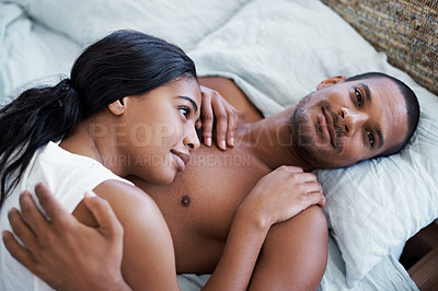 Buy stock photo Cropped shot of a young couple enjoying their morning at home