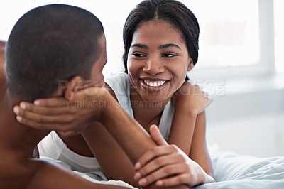 Buy stock photo Cropped shot of a young couple enjoying their morning at home