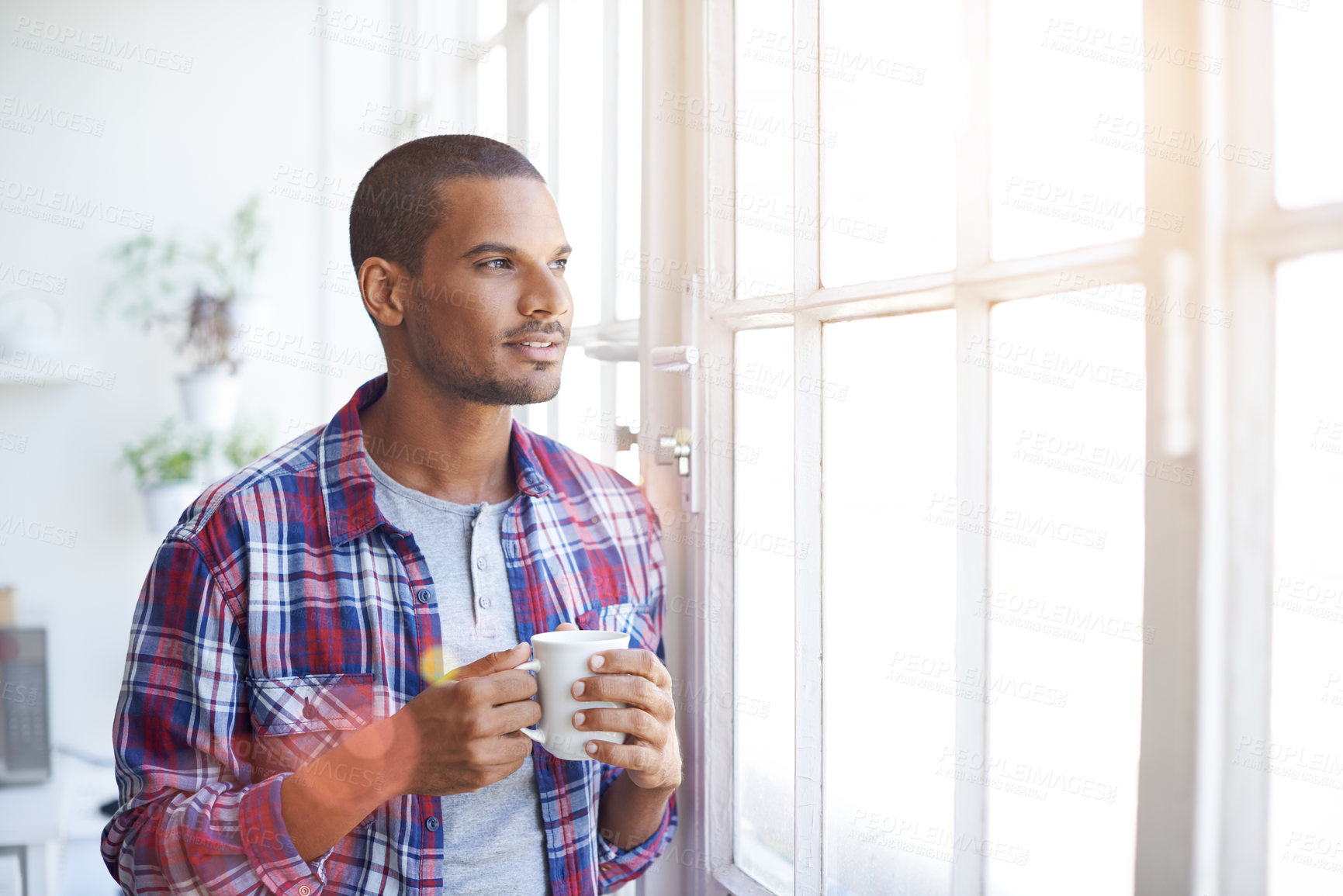 Buy stock photo Morning, thinking and man with coffee by window to start day, memory and relax in home. House, person and beverage for inspiration, reflection and decision with flare in apartment for perspective