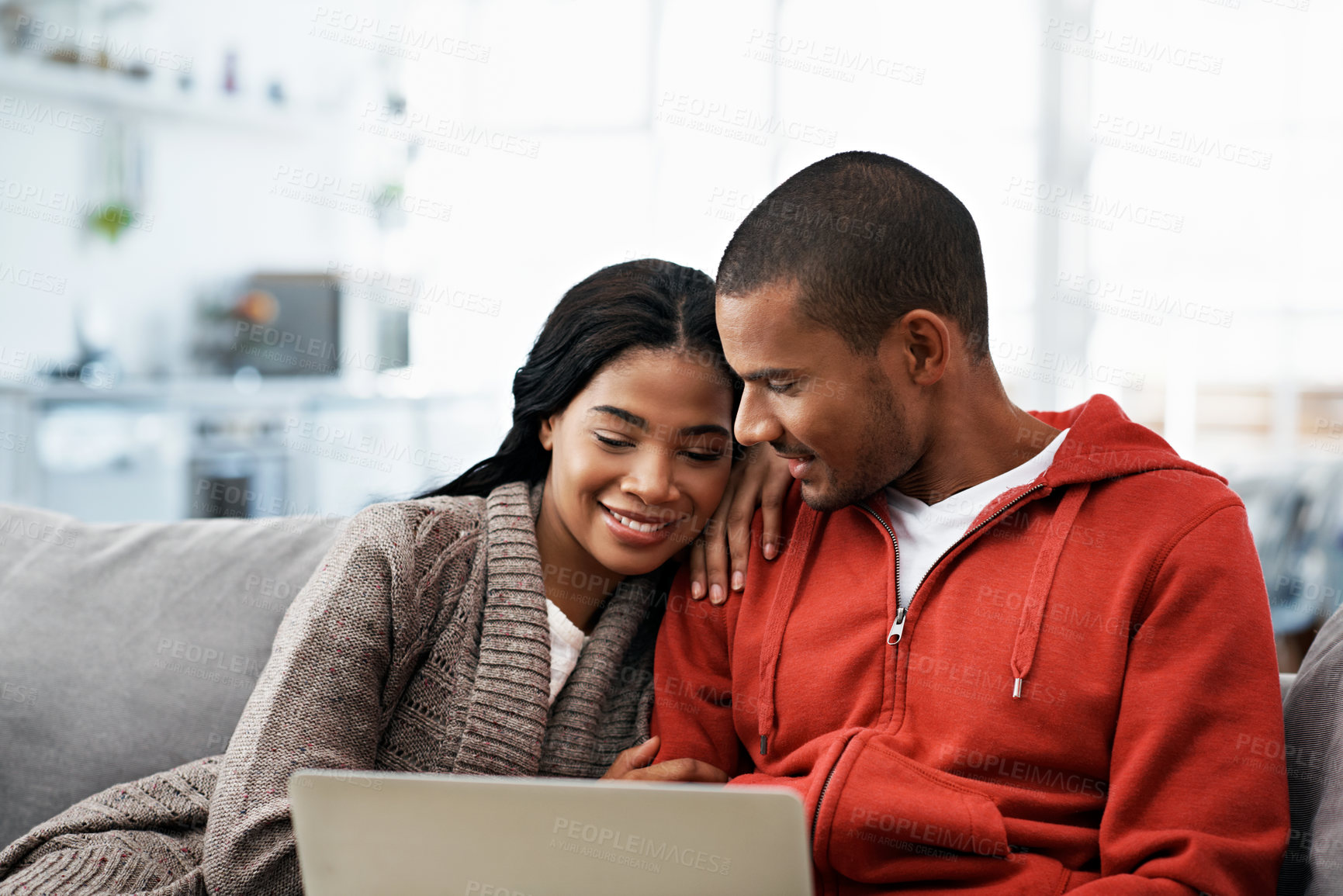 Buy stock photo Relax, travel and happy couple with laptop on sofa in home for planning vacation together. Man, woman or chilling with computer for holiday booking, online getaway or weekend accommodation in house