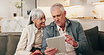 Smile, old couple and reading in home with tablet, good news and announcement for lottery winner. Happy, senior people and notification at house with digital, social media and giveaway prize on couch