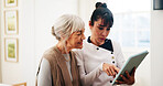 Caregiver, tablet and old woman in nursing home with discussion, medical research or tips for wellness. Nurse, senior person and talk in retirement center with tech, healthcare records and advice.
