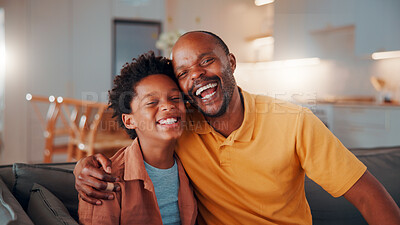 Buy stock photo Portrait, father and child in home with hug, funny joke and laugh for bonding together on weekend. Happy, African man and son in living room with embrace, support and humor for family connection.