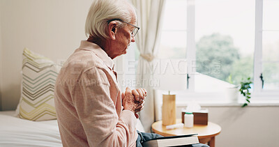 Buy stock photo Thinking, anxiety and senior man in bedroom with reflection, remember or memory on past decision. Hearing aid, ideas and elderly person on bed with regret, nostalgia or stress on retirement in home.