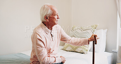 Buy stock photo Thinking, walking stick and senior man in bedroom at house for reflection, remember or retirement memory. Plan, nostalgia and elderly person with dementia on bed with ideas for pension in home.