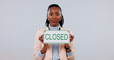 Buy stock photo Portrait, space and black woman with closed sign in studio for business closure, advertising or marketing. Serious, poster and employee with decline or no for corporate service on white background