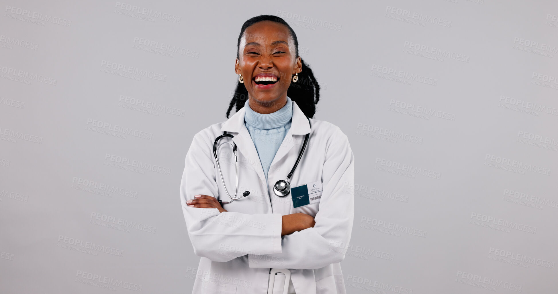 Buy stock photo Laugh, doctor and portrait of woman in studio for medical service, health support and mockup. Crossed arms, happy and African person with space for career, medicare and healthcare on white background