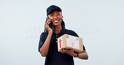Buy stock photo Box, black woman and portrait of courier with phone call in studio by space for distribution delivery. Happy, cargo and logistics worker on mobile discussion for cardboard parcel on white background.