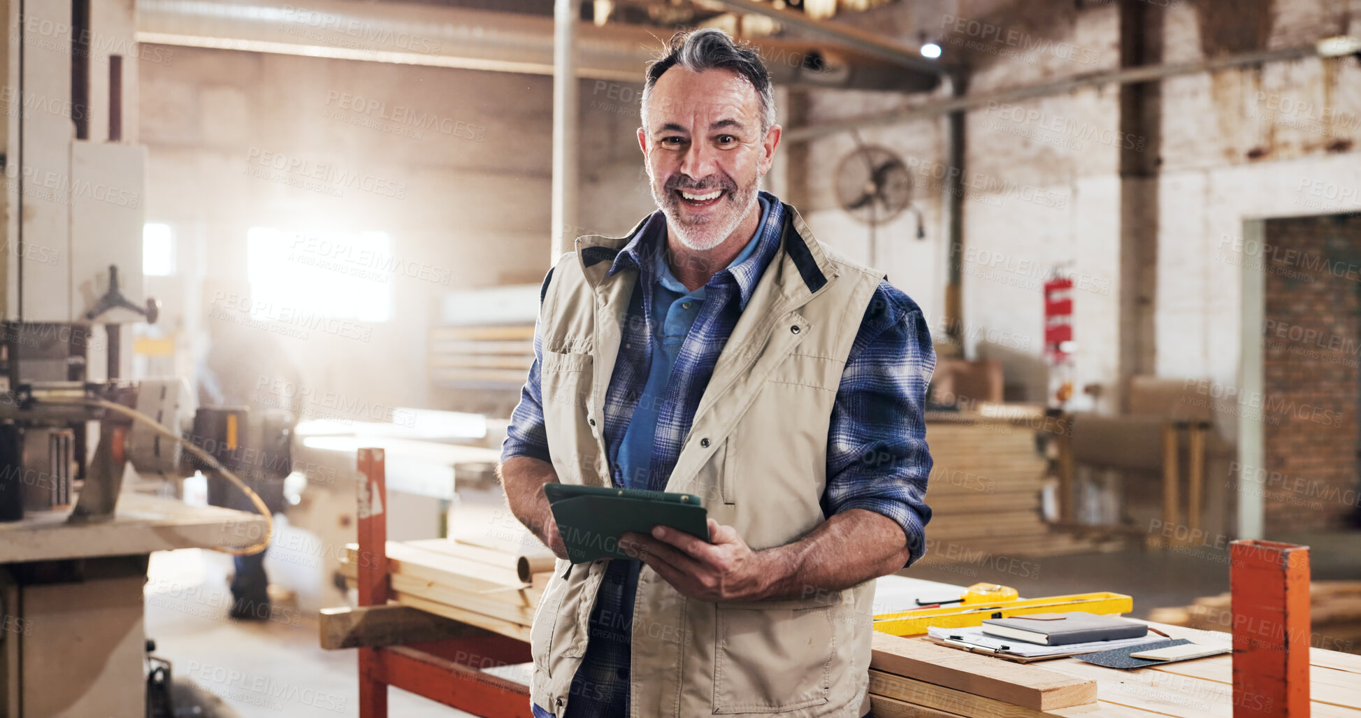Buy stock photo Tablet, man and portrait of carpenter in workshop with confidence for furniture manufacturing. Happy, artisan and mature woodworker with technology for timber production with research in factory.