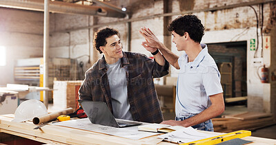 Buy stock photo Carpentry, high five and men with laptop for warehouse, planning and startup collaboration. Furniture, workshop and happy partnership for manufacturing, deal or renovation with lumber project meeting