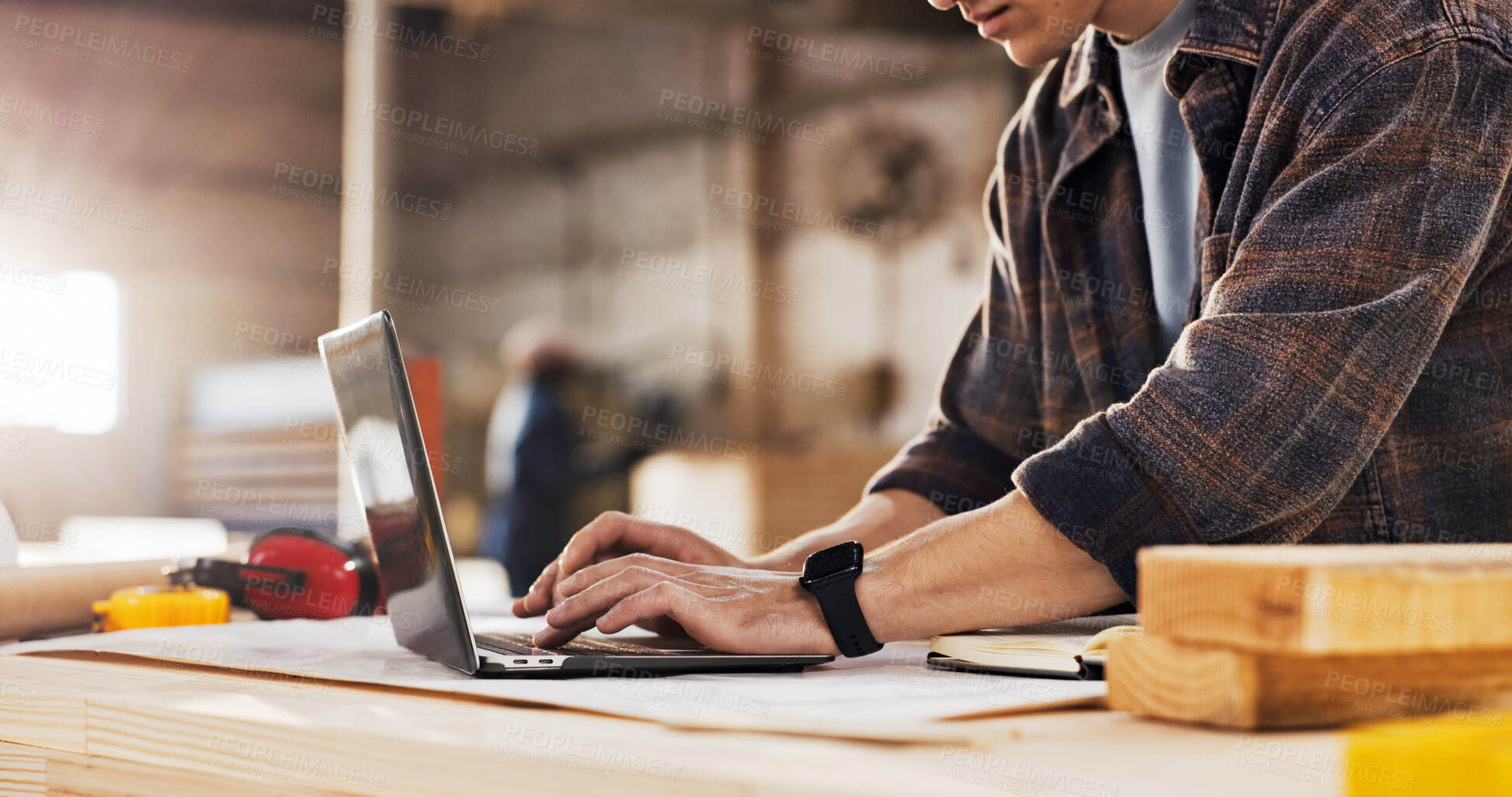 Buy stock photo Laptop, carpenter and hands of man in workshop for planning, project quote and furniture design. Carpentry, typing and person on computer for woodworking, production schedule and timber business