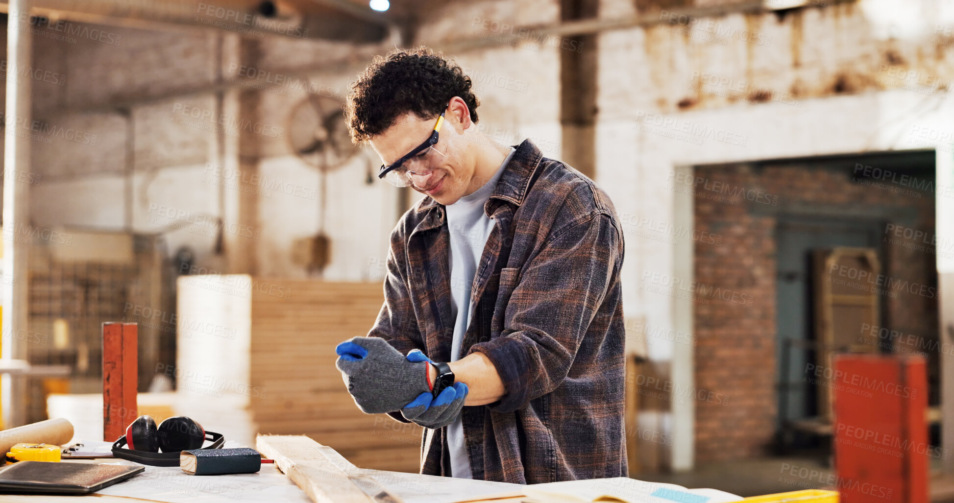 Buy stock photo Carpentry, workshop and man with wrist pain for accident, woodworking injury and carpal tunnel. Carpenter, warehouse and person with strain, inflammation and hurt for pressure, overworked and stress