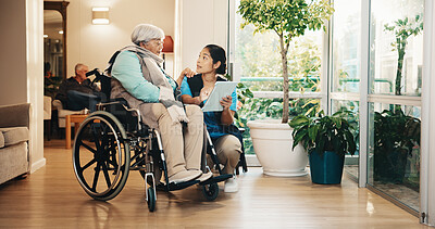 Buy stock photo Caregiver, tablet and old woman in nursing home with wheelchair, wellness survey and checkup discussion. Nurse, tech and senior person with disability, support or online checklist for injury recovery