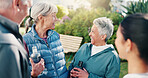 Senior, people and laugh outdoor with personal trainer, funny conversation and advice for wellness. Happy, old friends and fitness coach in retirement home garden with joke, humor and vitality tips.