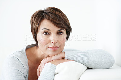 Buy stock photo Calm, portrait and woman on sofa for wellness, good mood or positive wellbeing on weekend break. Space, relax or person in living room with rest, comfortable day off and peaceful moment at home.