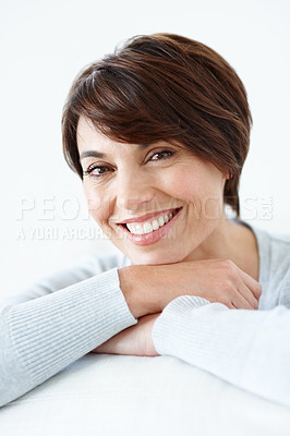 Buy stock photo Peace, portrait or happy woman on sofa with day off, good mood or positive wellbeing on weekend break. Unwind, smile or person in living room with chill, rest satisfaction or calm moment at home.