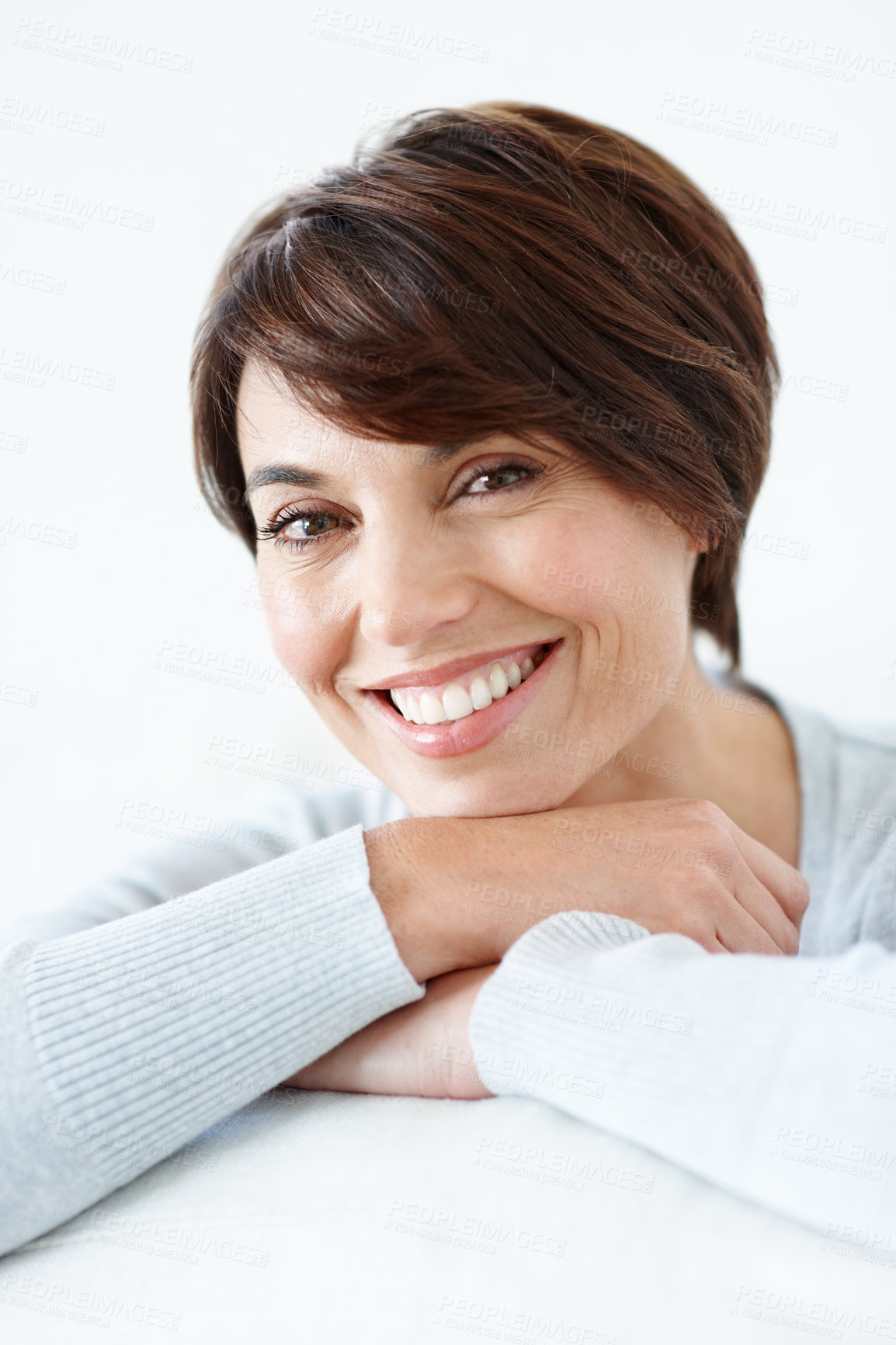 Buy stock photo Peace, portrait or happy woman on sofa with day off, good mood or positive wellbeing on weekend break. Unwind, smile or person in living room with chill, rest satisfaction or calm moment at home.