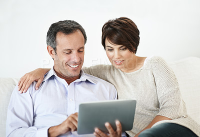 Buy stock photo Happy, couple and relax with tablet on sofa for website, online browsing or entertainment. Man, woman or chilling with smile or technology on couch for streaming app, subscription or network service