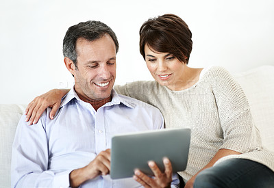 Buy stock photo Relax, sofa and happy couple with tablet for website, online browsing or entertainment together. Man, woman or smile with technology on couch for streaming app, subscription or network service