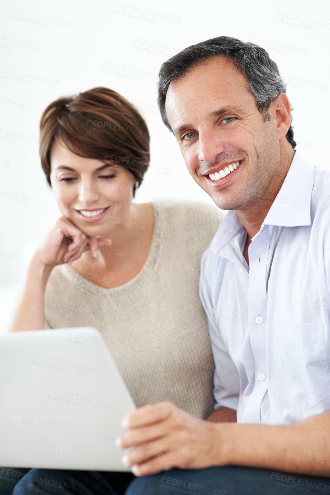 Buy stock photo Laptop, network or happy couple in studio for entertainment or online subscription on a white background. Man, woman or smile with technology for streaming service, web platform or digital connection