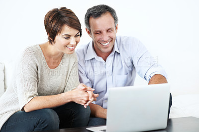 Buy stock photo Couple, laptop and happy with internet on home sofa for online connection, browsing and relax. Man, woman and technology in house living room for streaming, subscription or planning on website