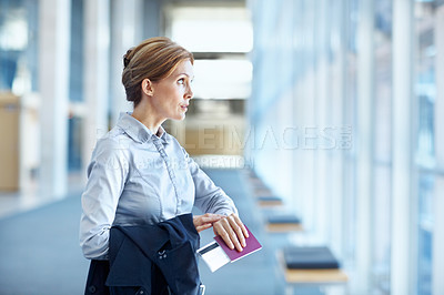 Buy stock photo Passport, businesswoman and watch at airport window to monitor flight, impatient and journey. Business travel, person and wristwatch in lobby for global trip, boarding time and waiting for departure
