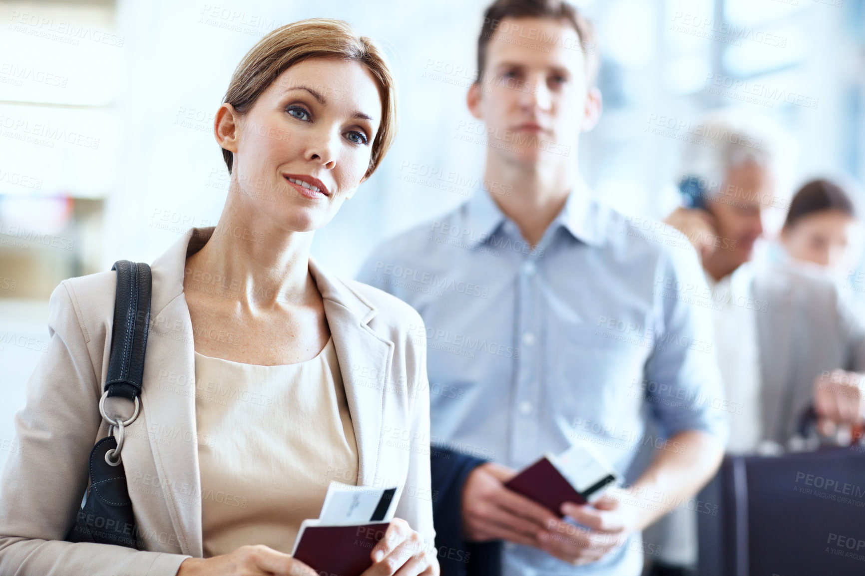 Buy stock photo Businesswoman, travel and queue in airport with passport, flight ticket or wait for overseas work trip. Person, line up and ID documents in terminal for departure, plan and leave for job opportunity.