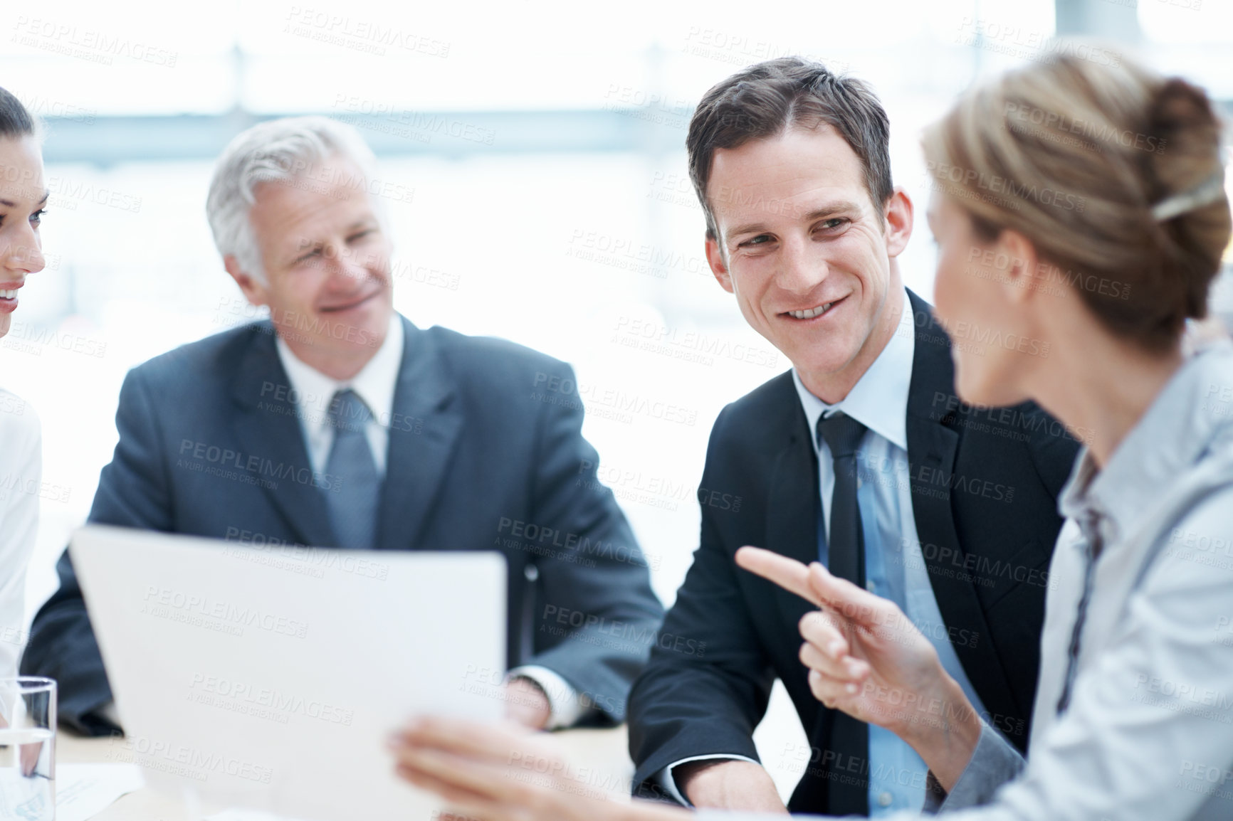 Buy stock photo Happy, meeting and business people with documents for finance, project budget or planning in office. Group, employees or discussion with smile or paperwork for financial proposal or fund in workplace