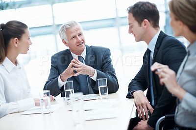 Buy stock photo Business people, meeting and team talking with CEO in office for financial compliance, report or briefing. Plan, manager and person with proposal, investment regulation or risk management strategy
