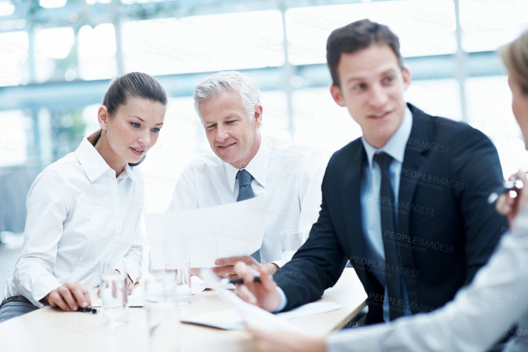 Buy stock photo Business people, meeting and team planning with document for financial compliance, report or strategy. Idea, paperwork or employees with suggestion, investment regulation or risk management in office