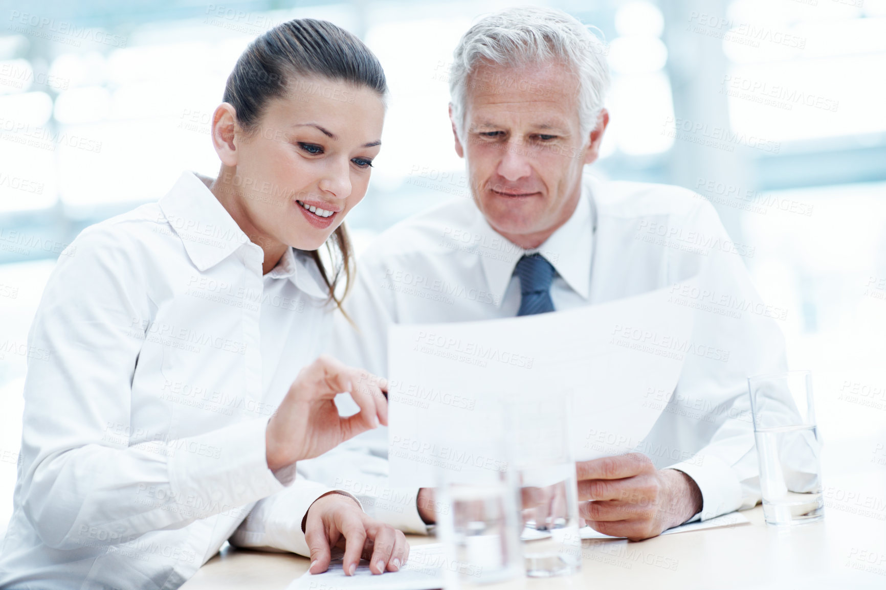 Buy stock photo Corporate, people and manager in office with documents, financial statement and discussion for audit. Accounting, team and finance management in firm with paperwork, review and planning for business.