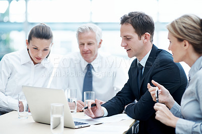 Buy stock photo Corporate, people and manager at law firm with laptop, paralegal and lawyer research for litigation. Attorney, team and conversation in office with computer, strategy and administration for lawsuit.